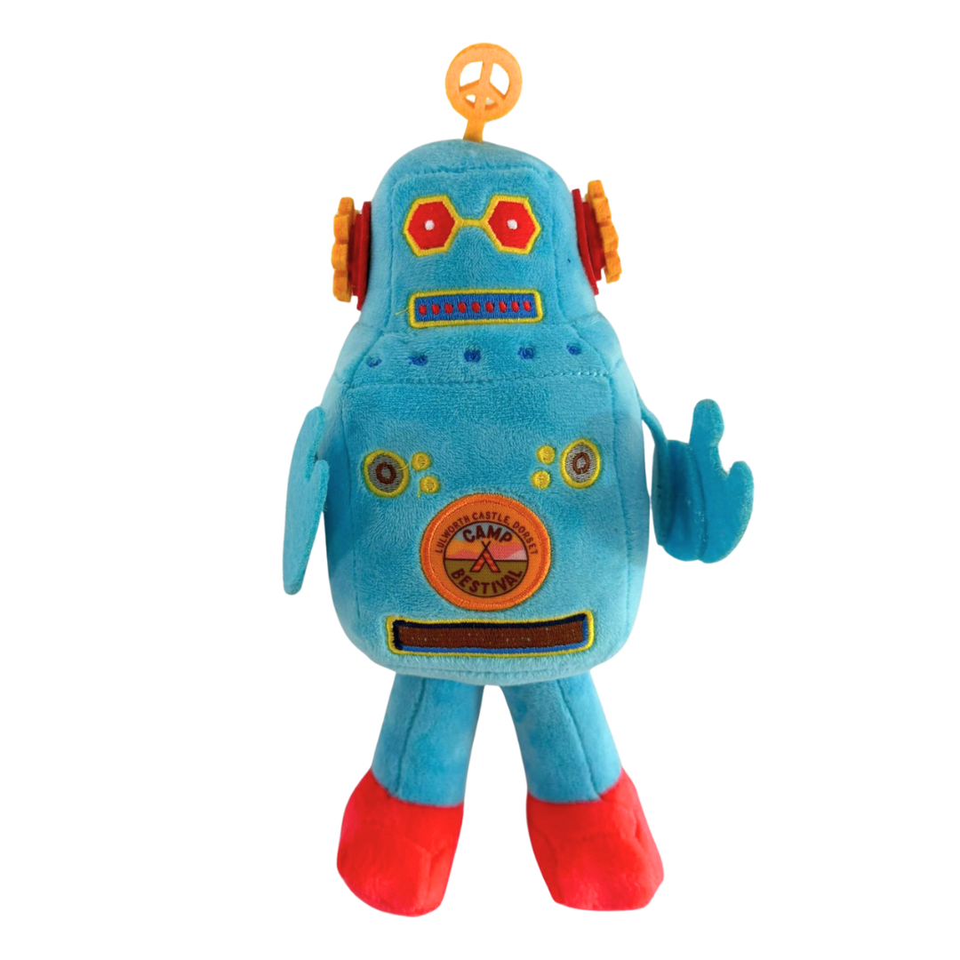 The Camp Bestival Love-Bot Plush by 2025 is a blue robot toy with red feet, orange ear-like sides, hexagonal red eyes, a circular belly emblem, a yellow top antenna, and one arm raised in a wave.