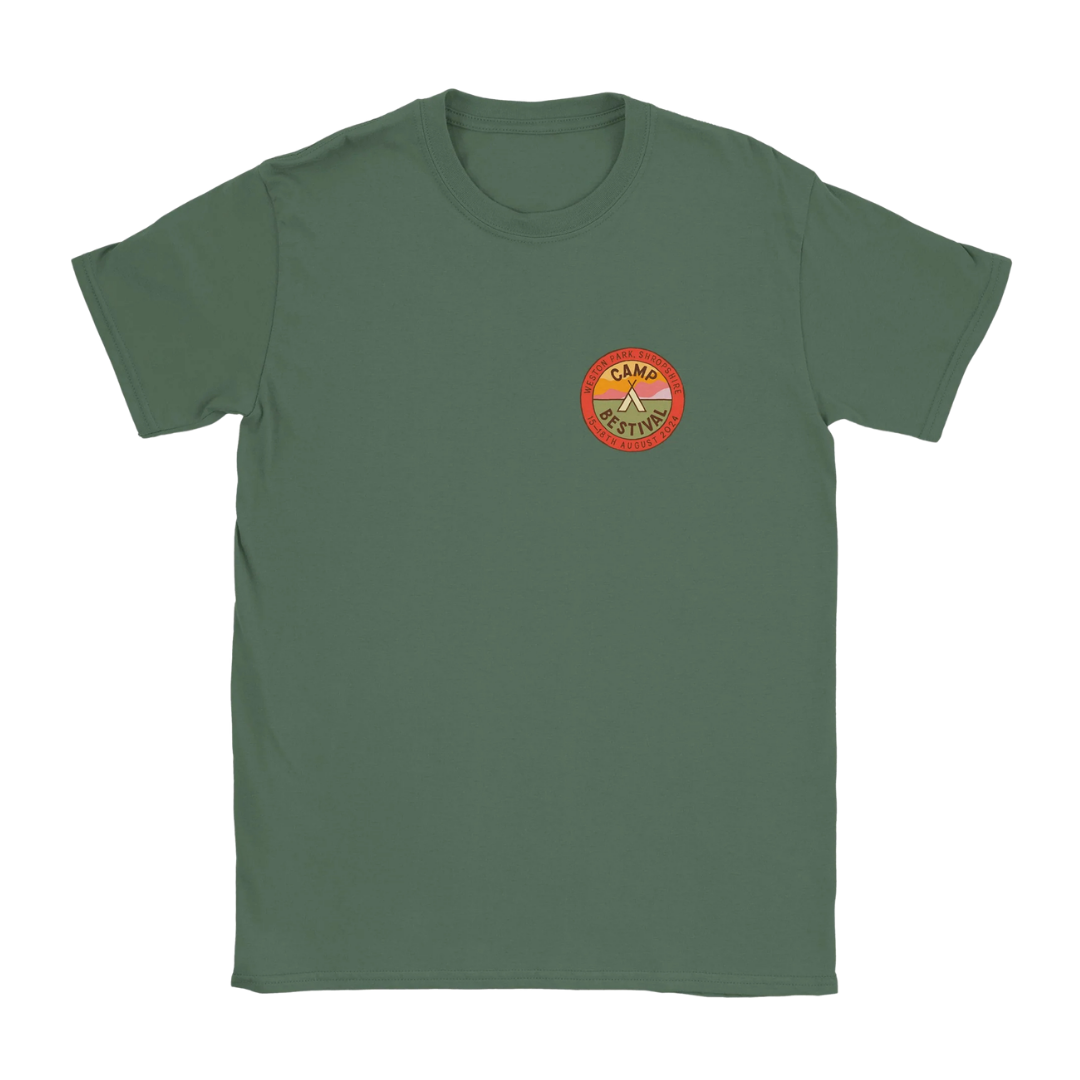 The Camp Bestival 2024 Shropshire Event Tee by Camp Bestival is a green ringspun cotton shirt with a small round orange and yellow "Camp Positive" tent and trees logo on the left chest.