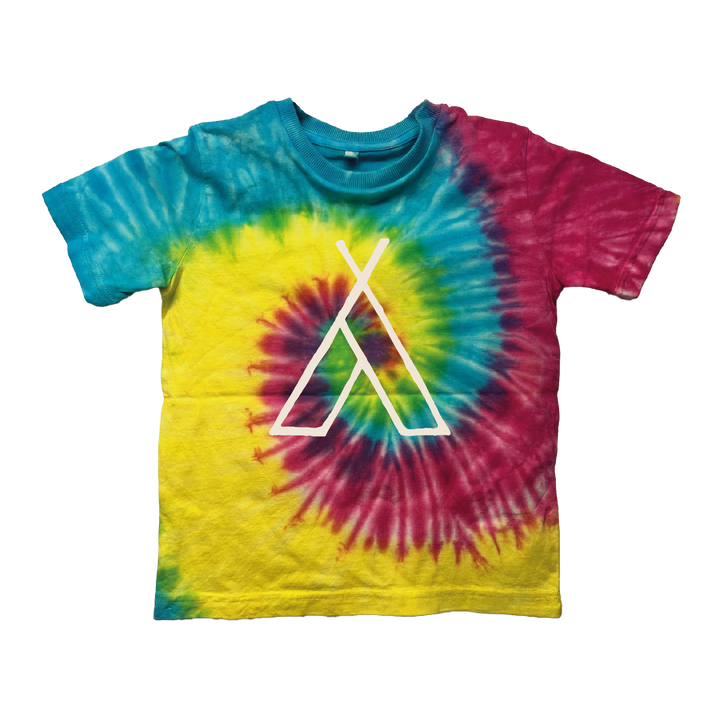 The 2025 Camp Bestival Kids T-Shirt Tie Dye Rainbow features pink, yellow, blue, and green swirls with a white geometric tent design in the center, shown on a plain white background.